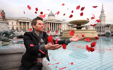 Remembrance Day - Poppies floating in pool. Copyright the Royal British Legion
